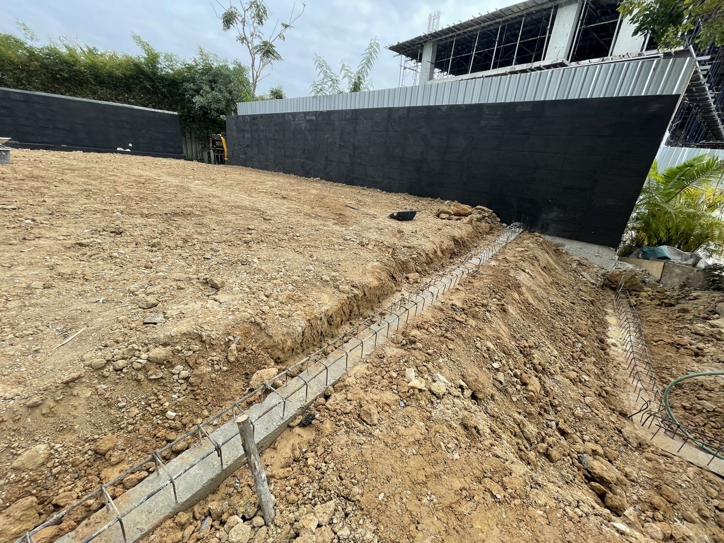 Tile wall work and sales office front steps including making stairs